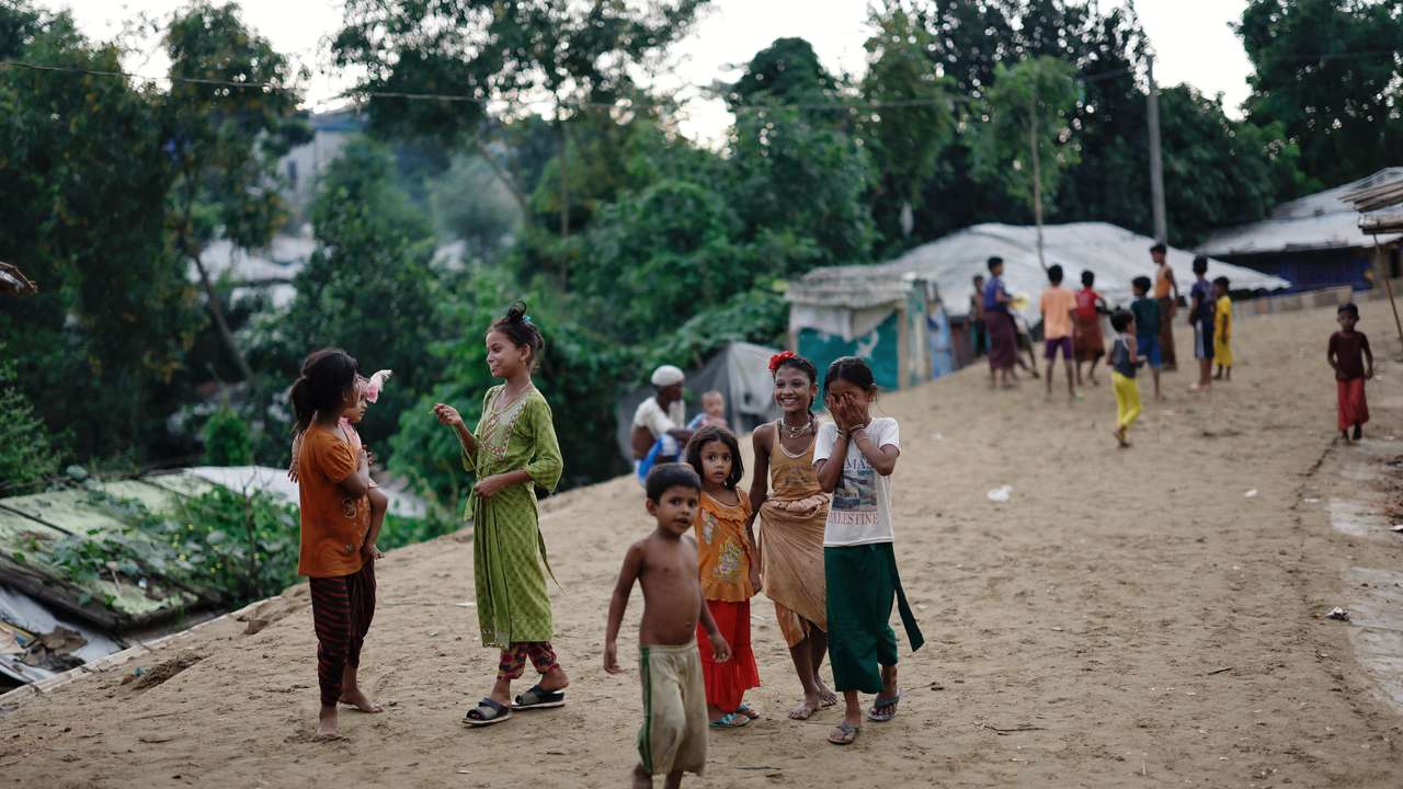 Rohingya refugee children roam on a road at the Kutupalong refugee camp in Cox's Bazar