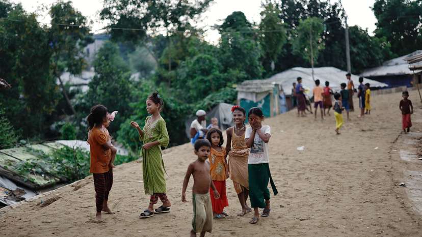 Rohingya refugee children roam on a road at the Kutupalong refugee camp in Cox's Bazar