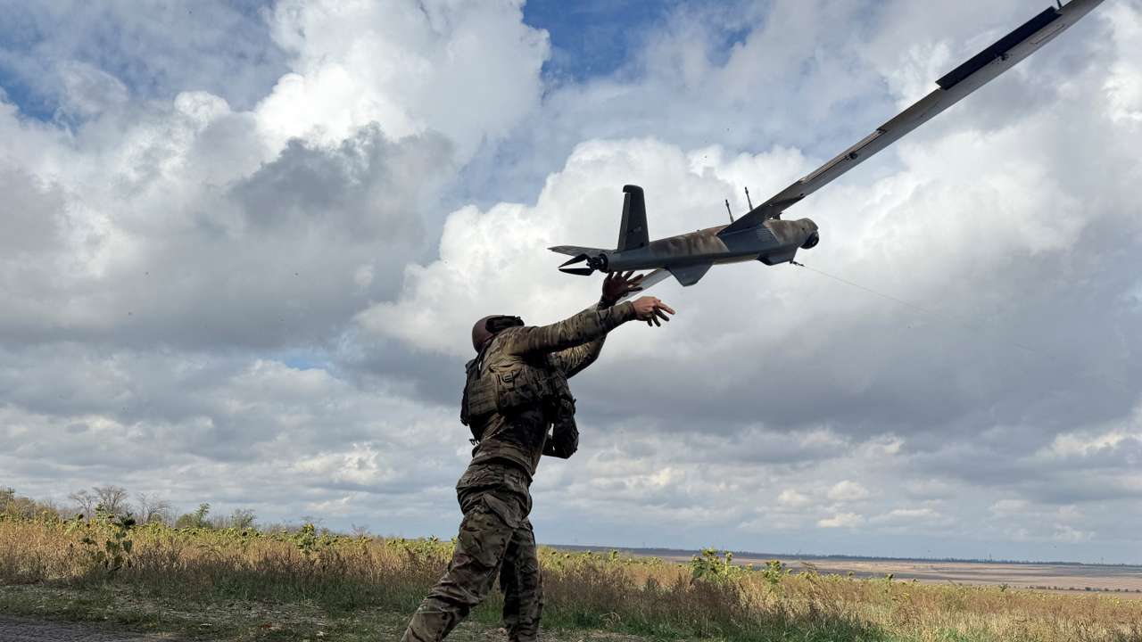 Ukrainian serviceman launches a reconnaissance drone near the frontline town of Pokrovsk