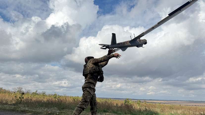 Ukrainian serviceman launches a reconnaissance drone near the frontline town of Pokrovsk