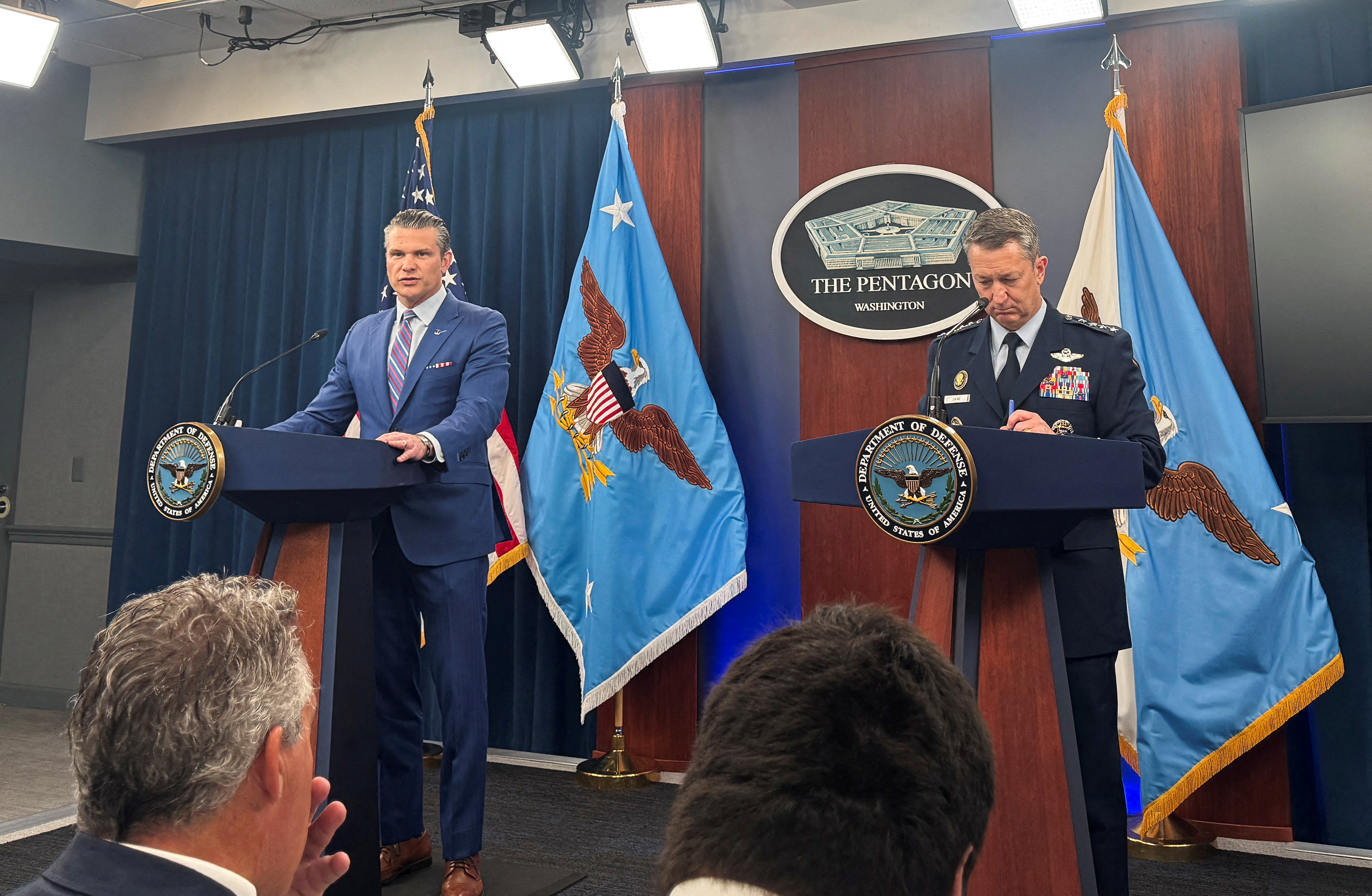 FILE PHOTO: U.S. Defense Secretary Hegseth and Air Force Chief Caine hold briefing at Pentagon