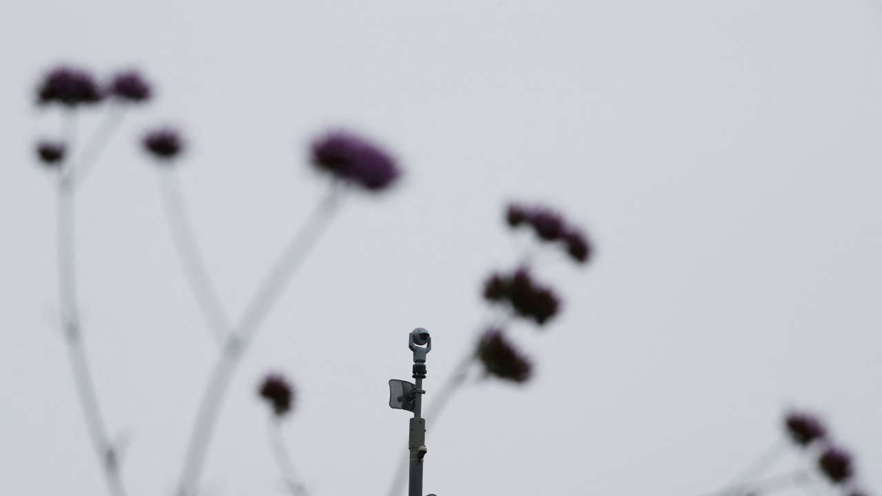 FILE PHOTO: A surveillance camera is seen in the Kings Cross area in London