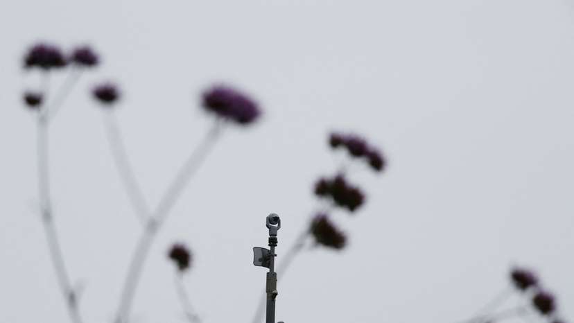 FILE PHOTO: A surveillance camera is seen in the Kings Cross area in London