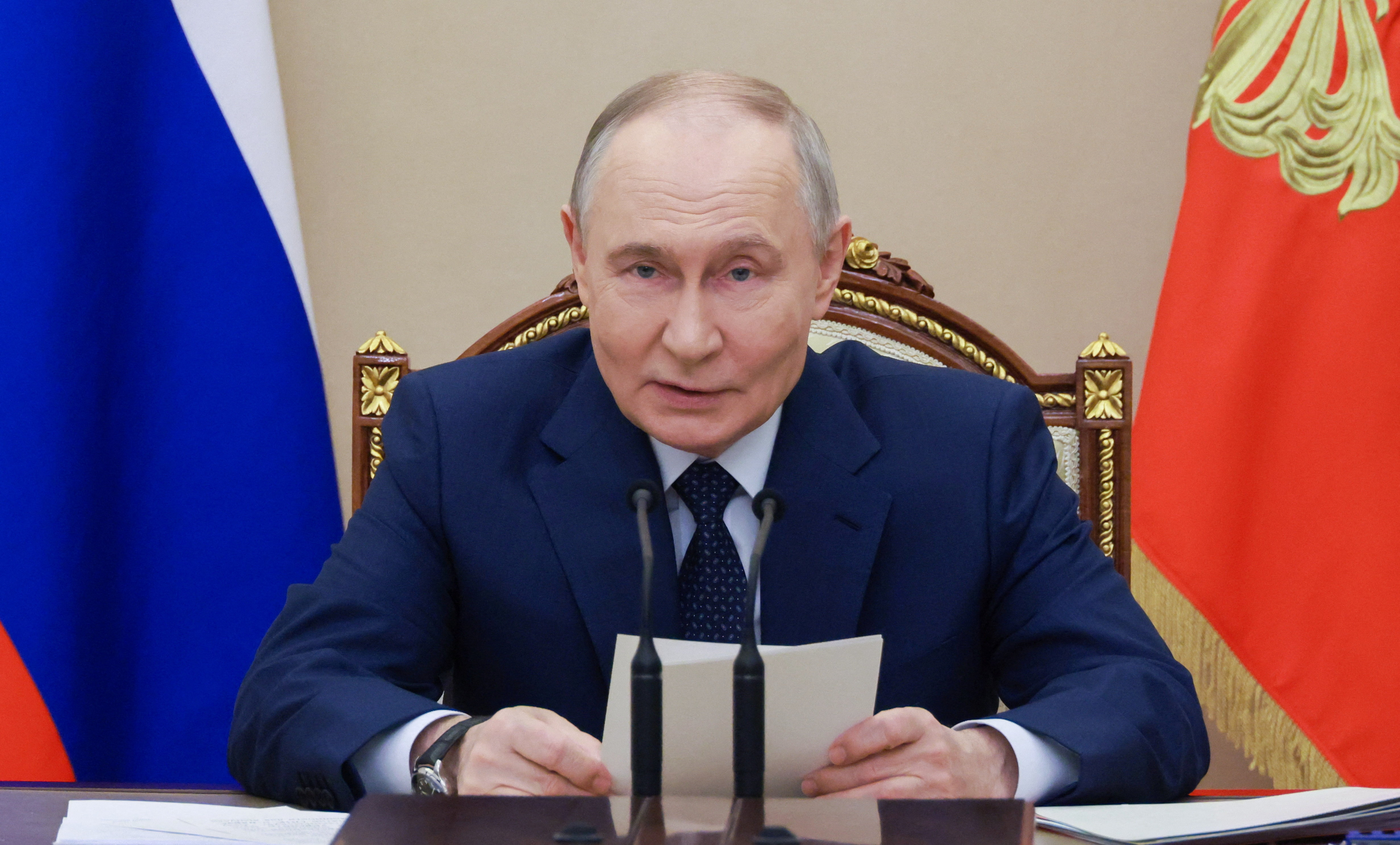 Russian President Vladimir Putin chairs a meeting on arms production in Moscow