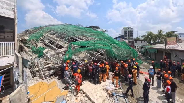 Philippines building collapse leaves dead and missing as rescue efforts continue