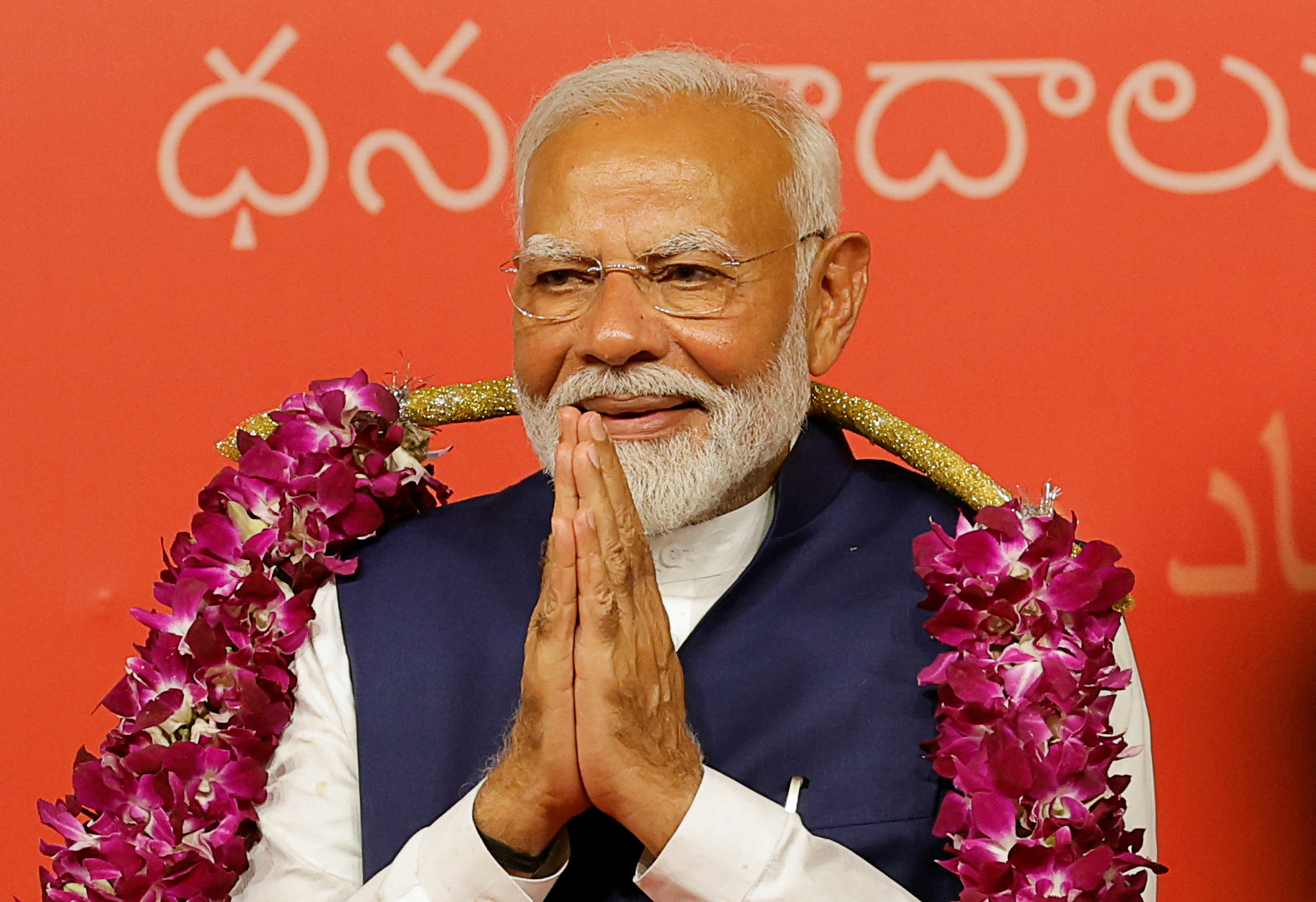 Indian PM Modi speaks to supporters at the BJP headquarters, in New Delhi