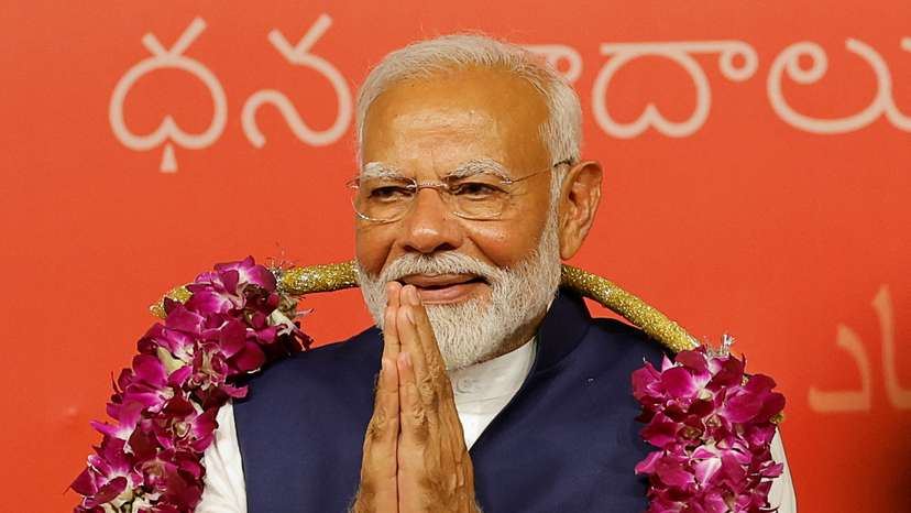 Indian PM Modi speaks to supporters at the BJP headquarters, in New Delhi