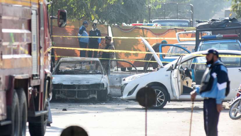A police officer stands at the site of a blast outside a court building in Islamabad