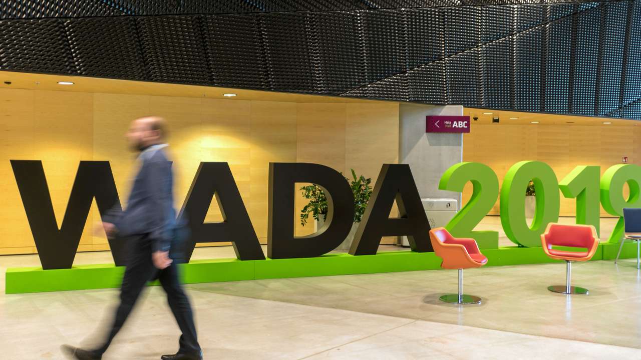 A man walks at the World Anti-Doping Agency (WADA) venue on the eve of the Fifth World Conference on Doping in Sport in Katowice