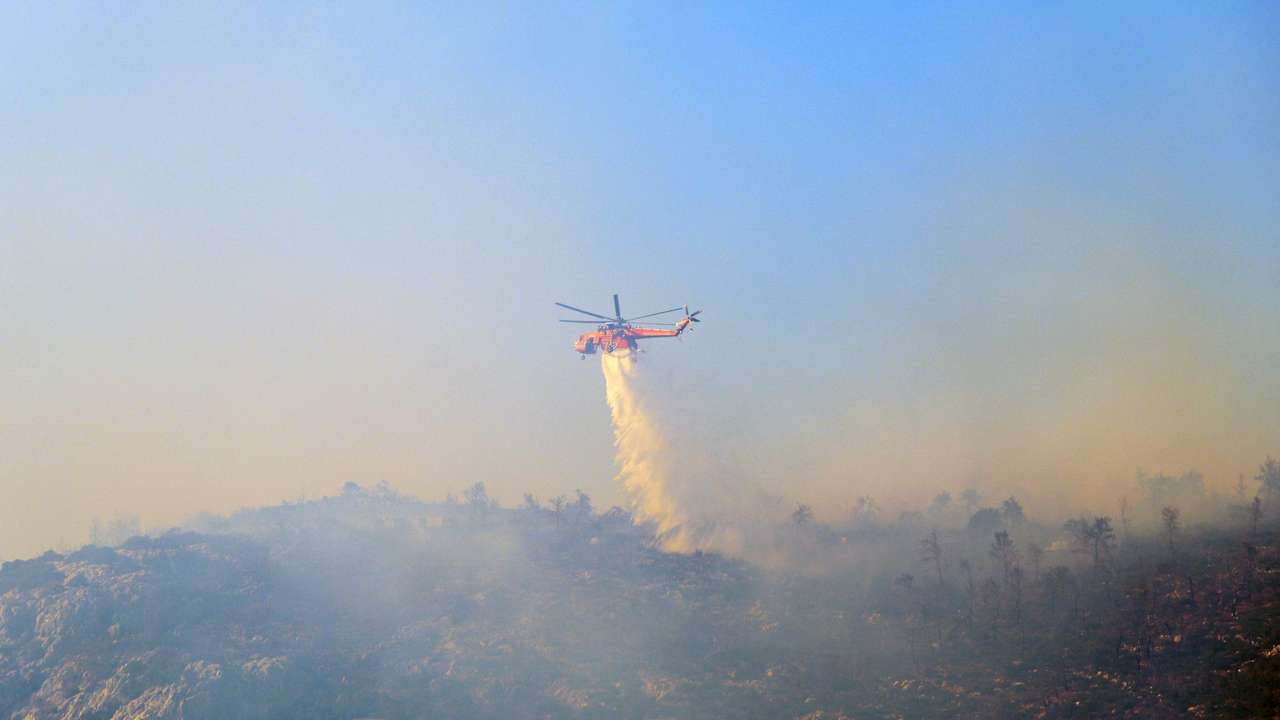 Wildfire burns on Mount Parnitha, near Athens