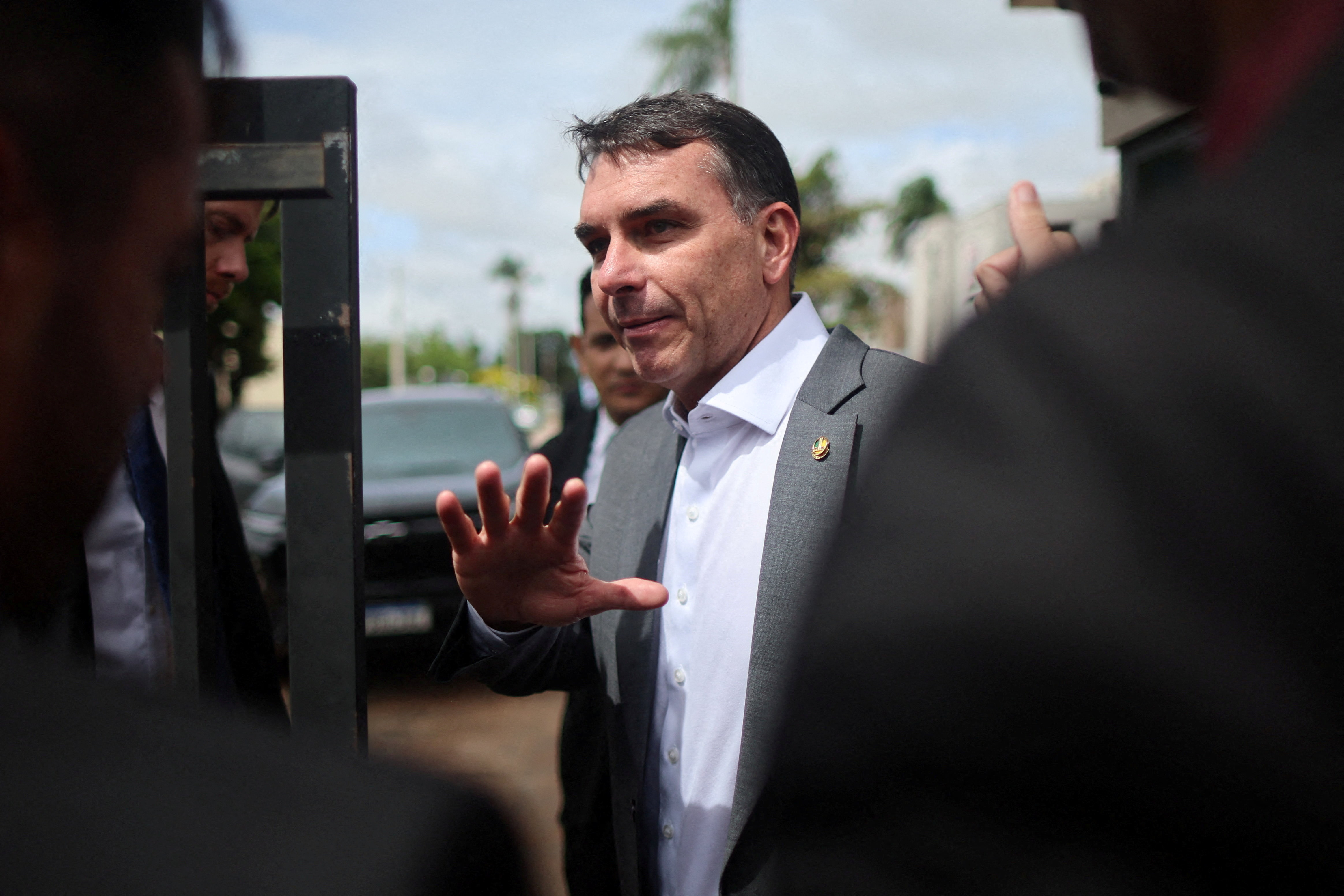 Senator Flavio Bolsonaro visits his father, former President Jair Bolsonaro, at a Federal Police building in Brasilia