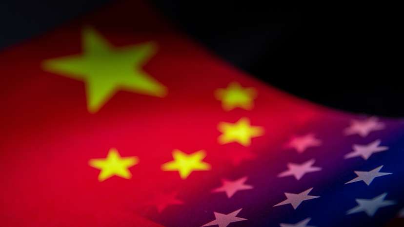 Illustration shows China's and U.S.' flags