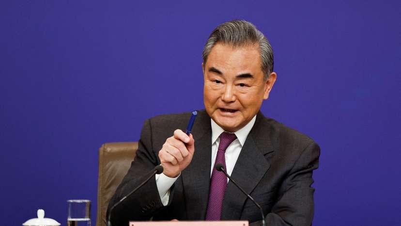 FILE PHOTO: Chinese Foreign Minister Wang Yi attends a press conference on the sidelines of the NPC, in Beijing