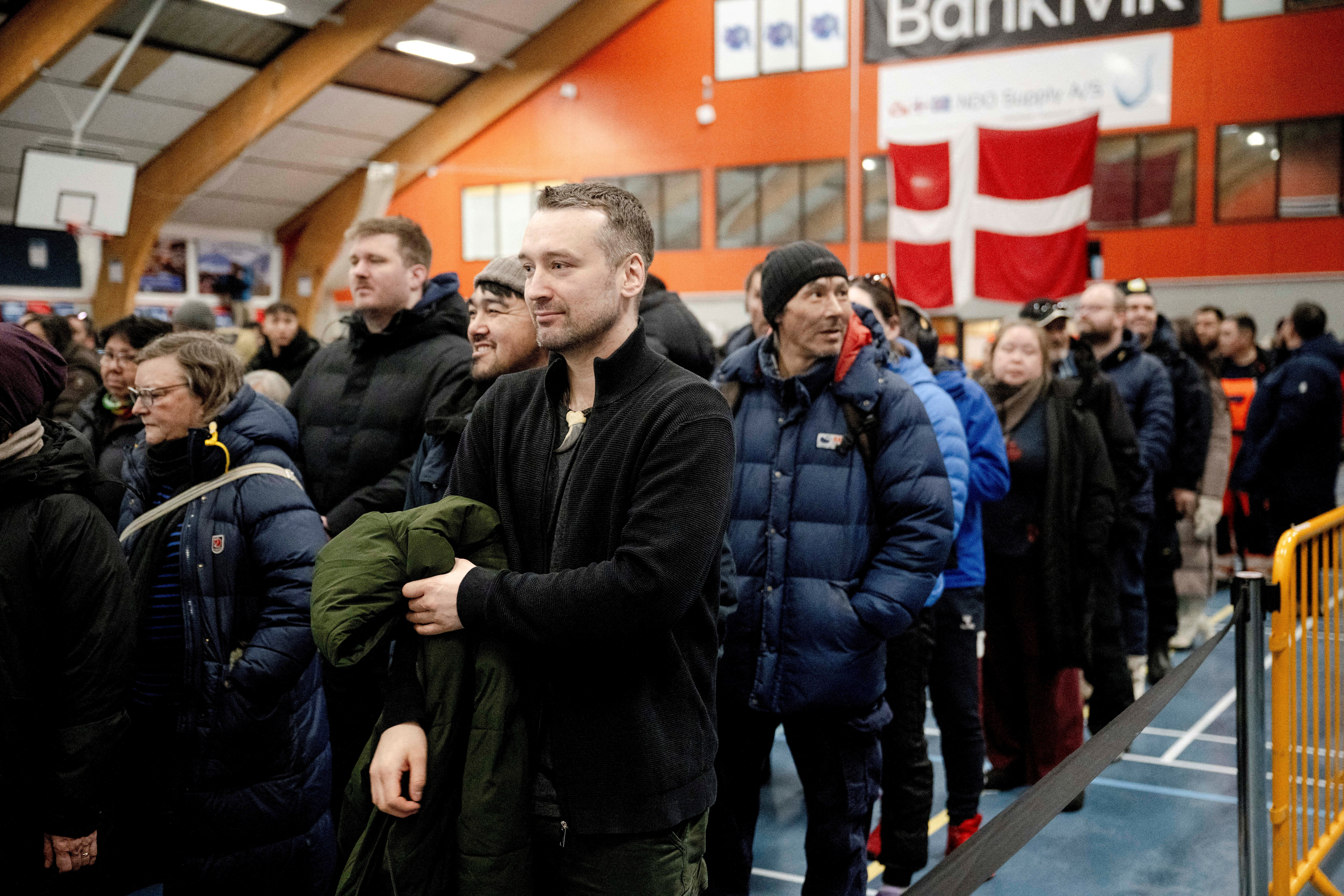 FILE PHOTO: Qarsoq Hoegh-Dam from Naleraq party votes at a polling station in Nuuk