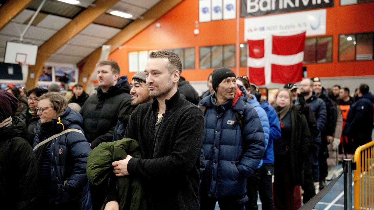 FILE PHOTO: Qarsoq Hoegh-Dam from Naleraq party votes at a polling station in Nuuk