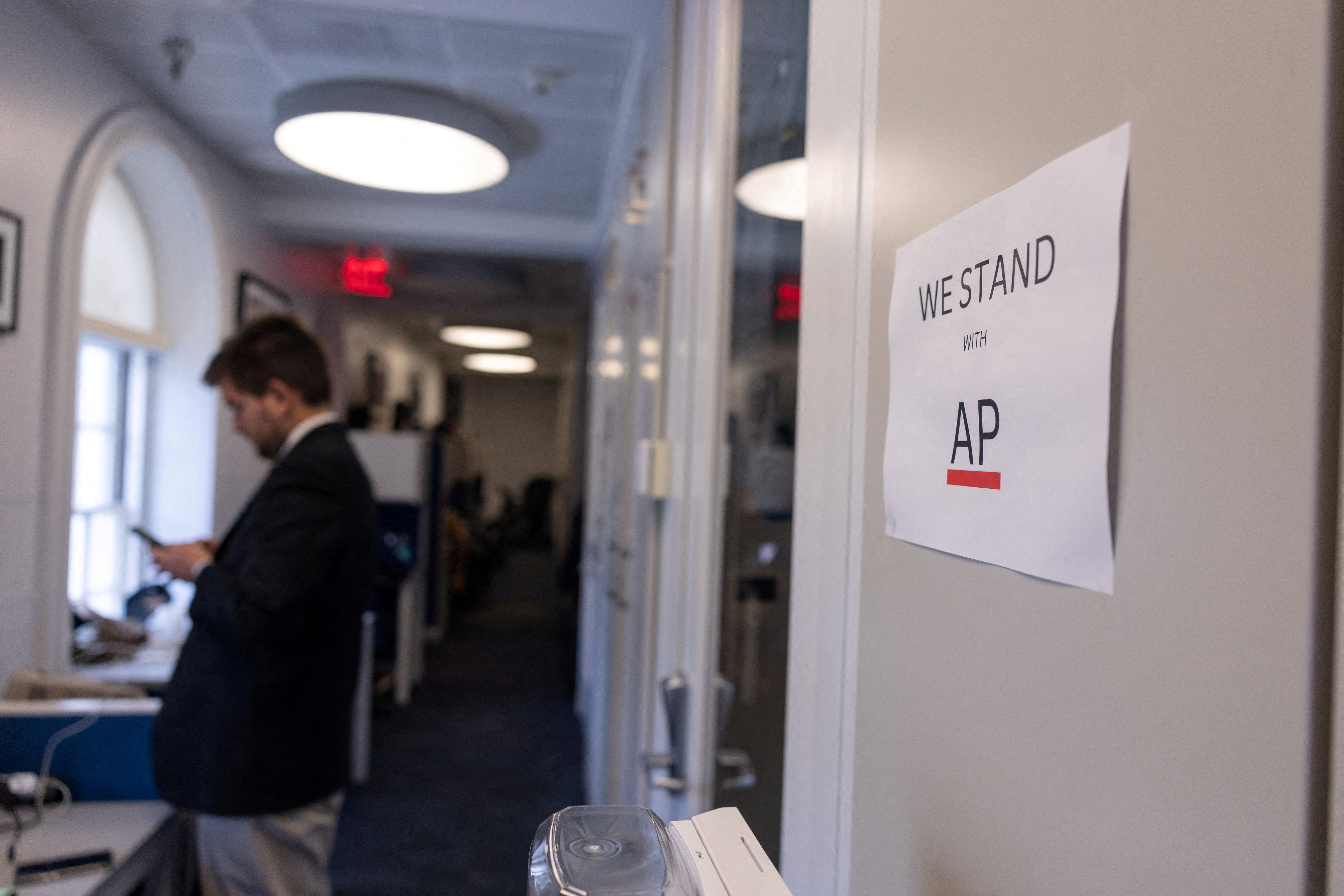 FILE PHOTO: Sign reads, "We Stand with AP", at the White House in Washington, D.C.