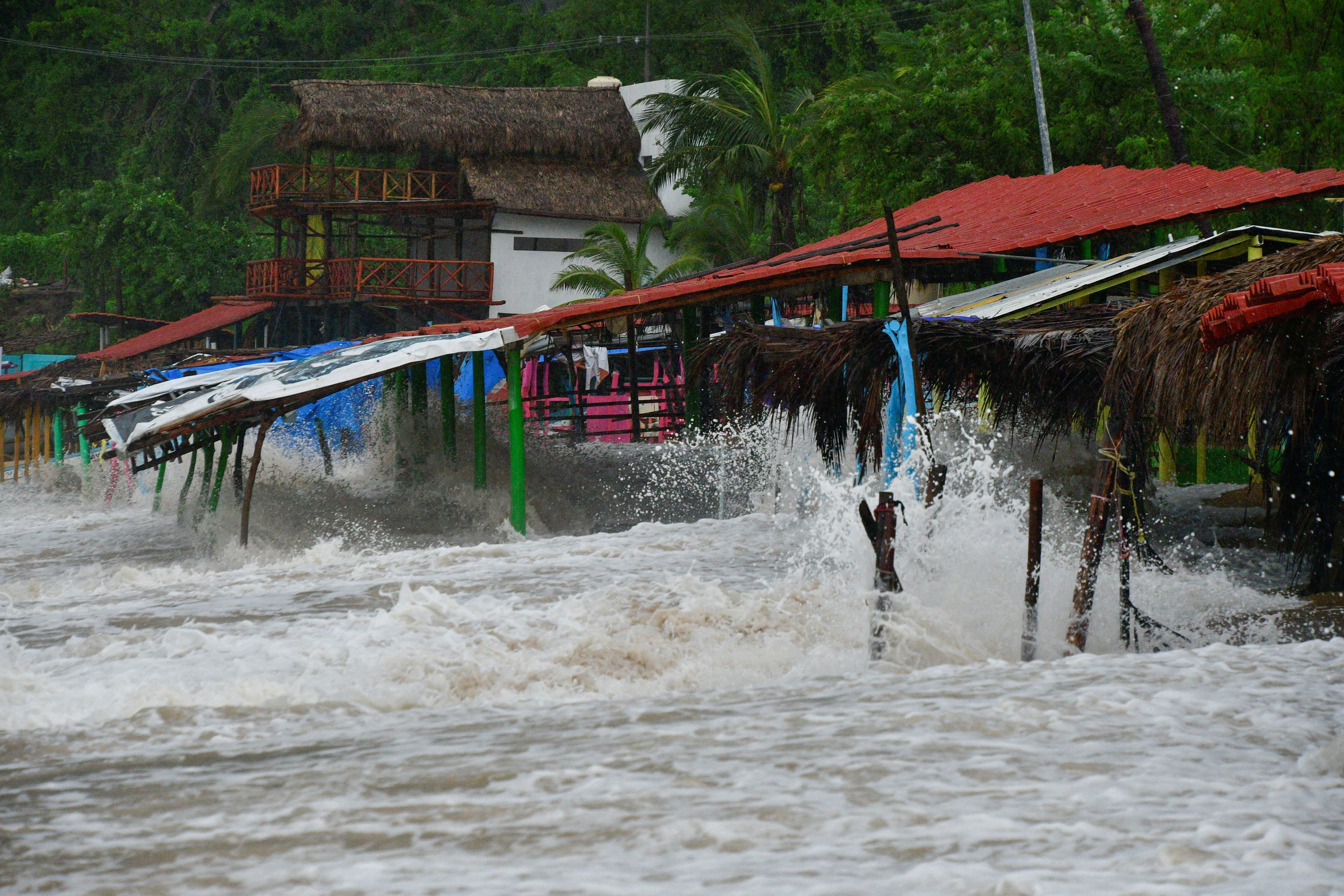 Tropical Storm John to become hurricane again as it hurtles back into Mexico