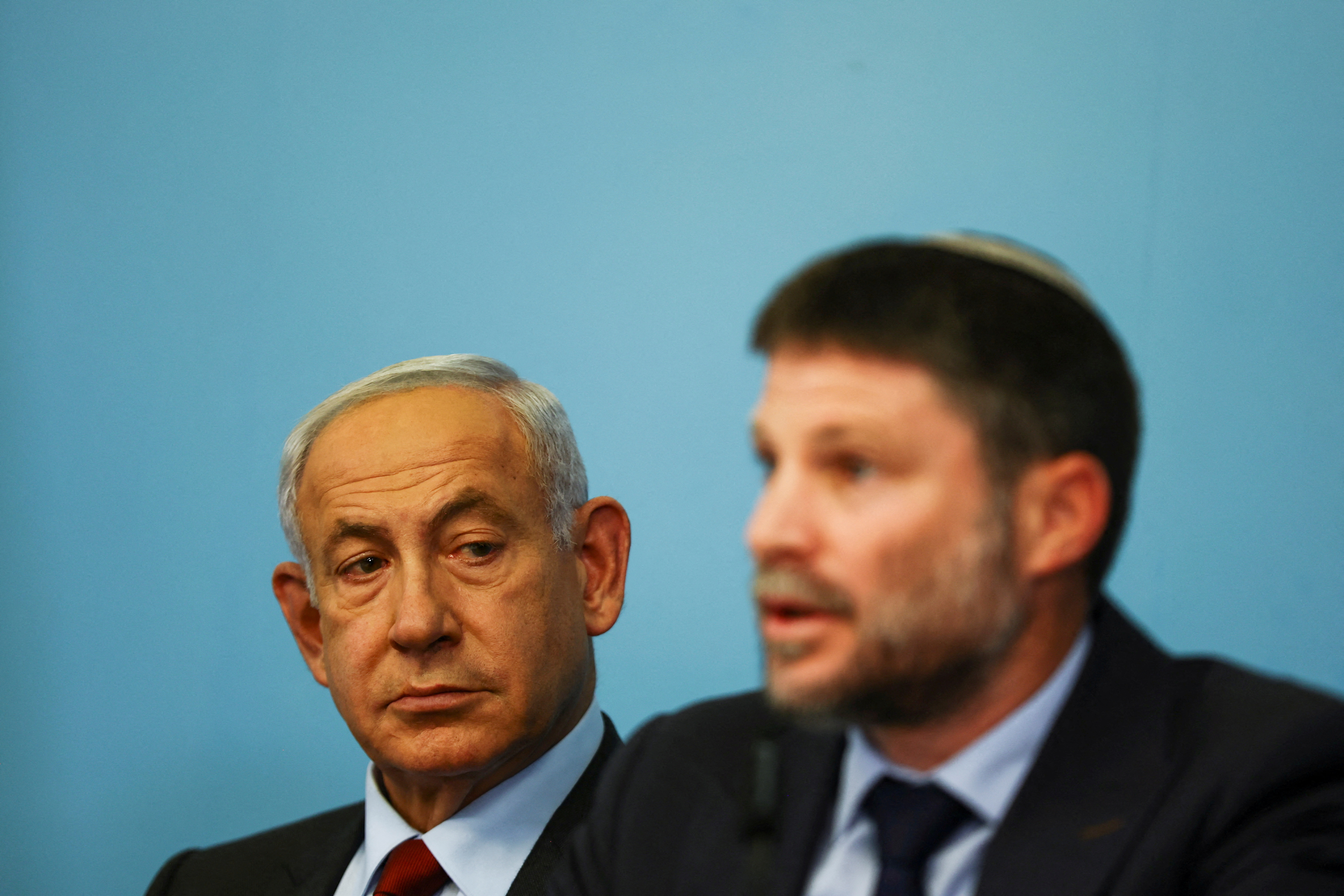 FILE PHOTO: Israeli Prime Minister Benjamin Netanyahu and Israeli Finance Minister Bezalel Smotrich hold a news conference at the Israeli Prime Minister's office in Jerusalem