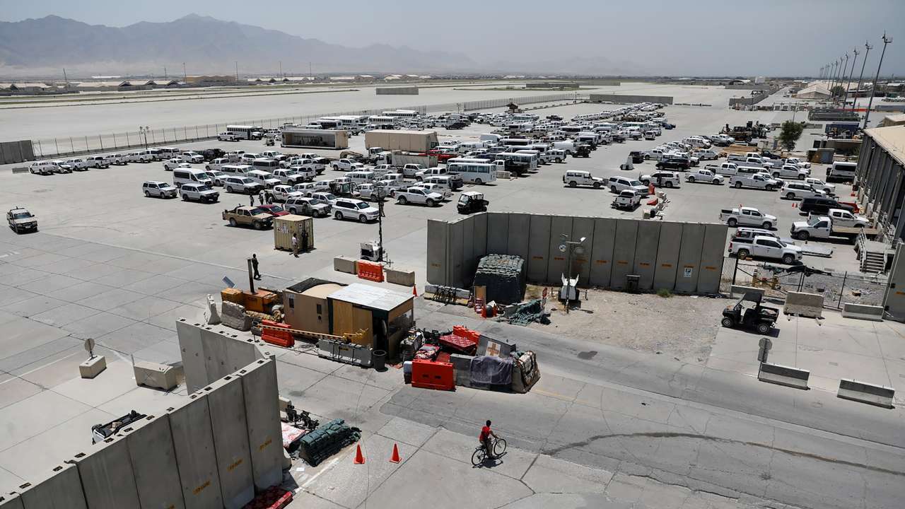 Parked vehicles are seen in Bagram U.S. air base, after American troops vacated it, in Parwan province