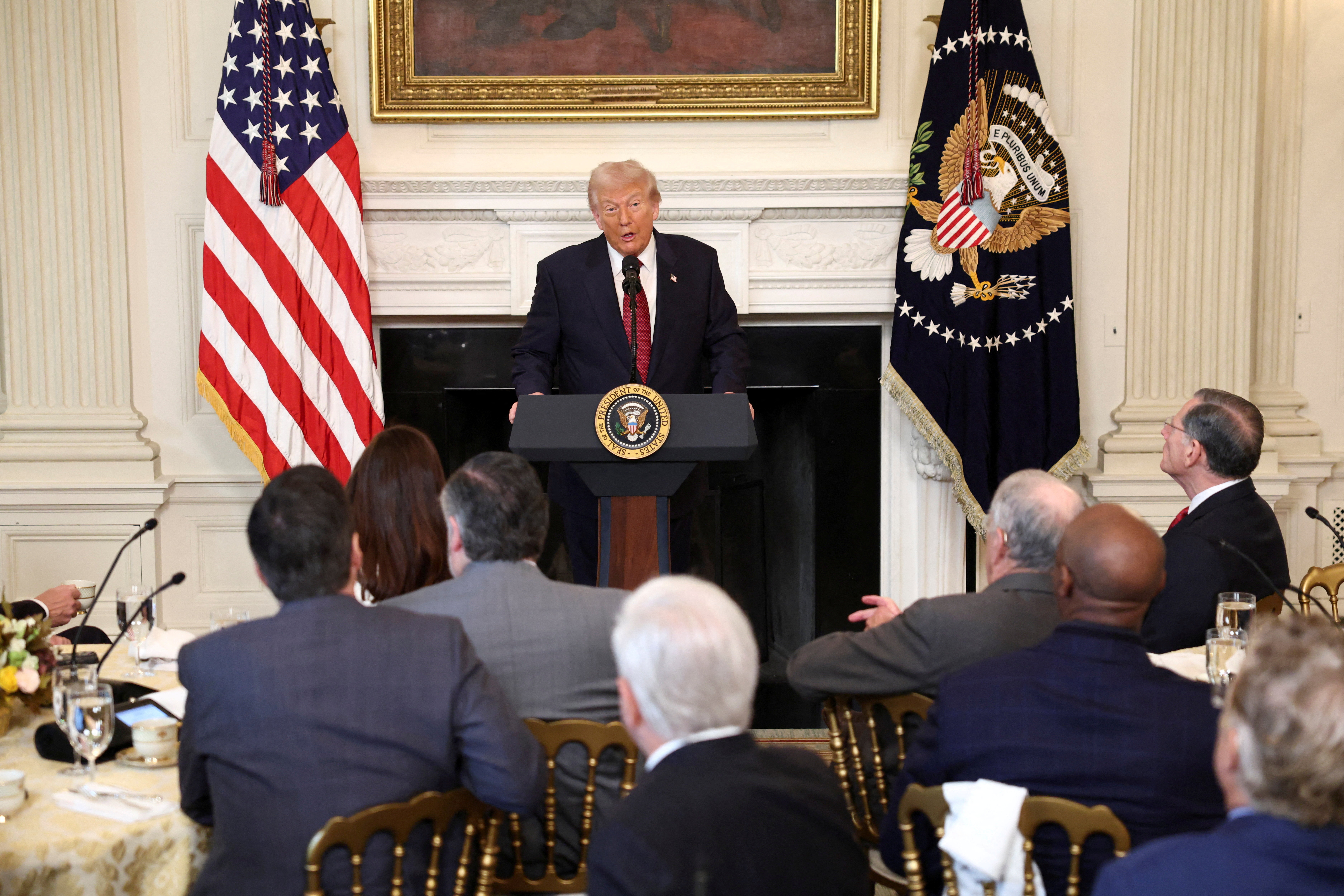 FILE PHOTO: U.S. President Donald Trump speaks during a breakfast with Republican Senators at the White House