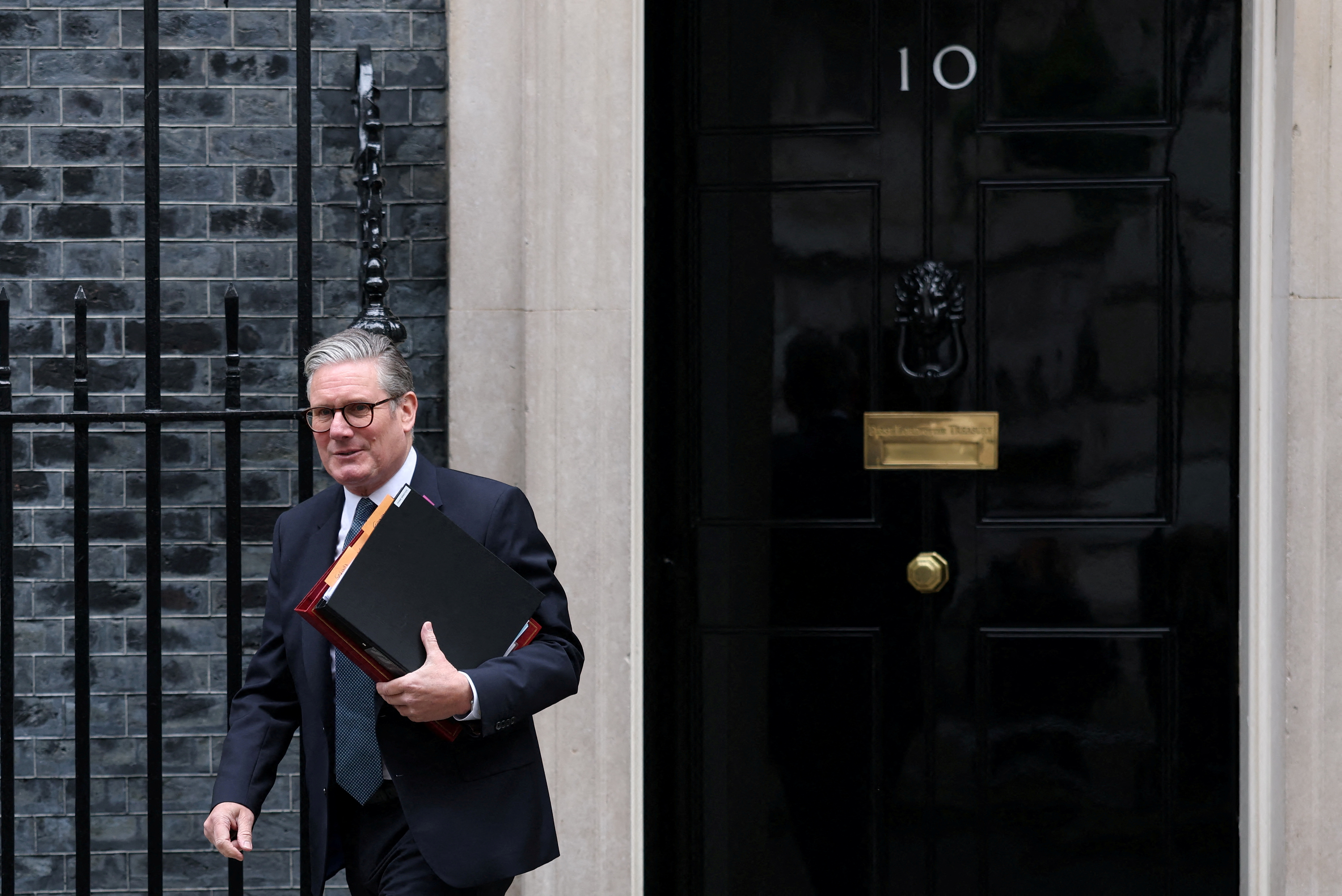 FILE PHOTO: British Prime Minister Keir Starmer leaves 10 Downing Street in London