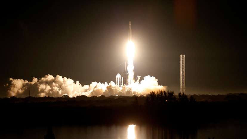 The U.S. military's secretive X-37B robot spaceplane lifts off atop a SpaceX Falcon Heavy rocket