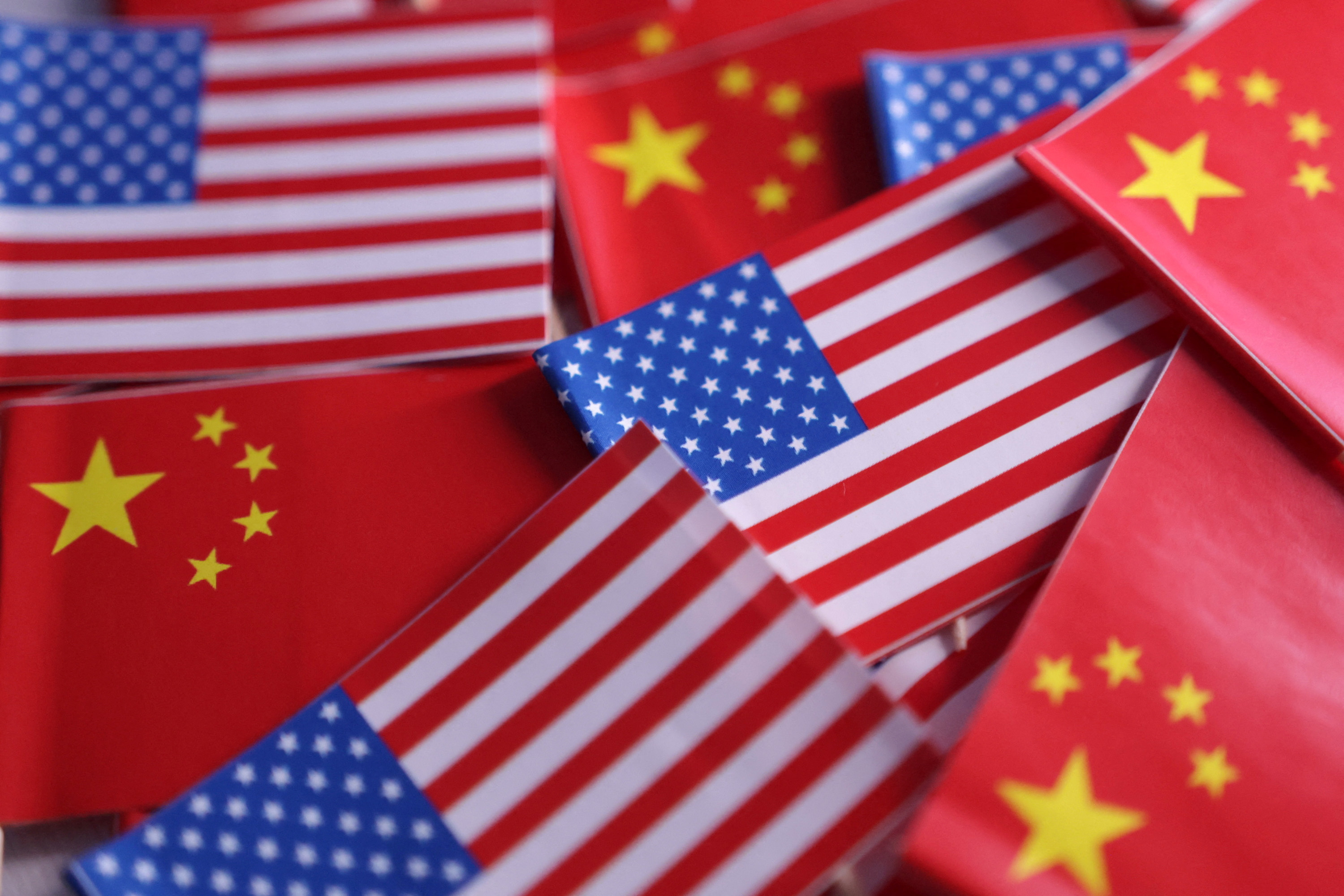 Illustration shows U.S. and Chinese flags