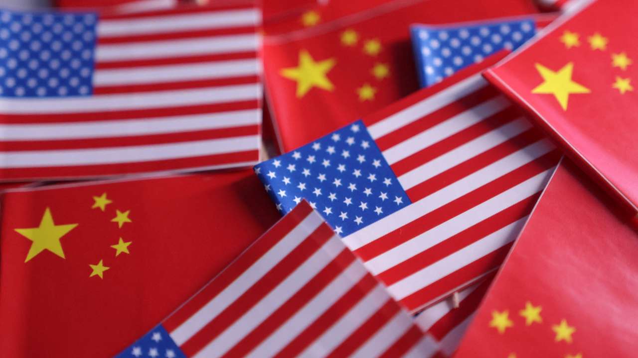 Illustration shows U.S. and Chinese flags