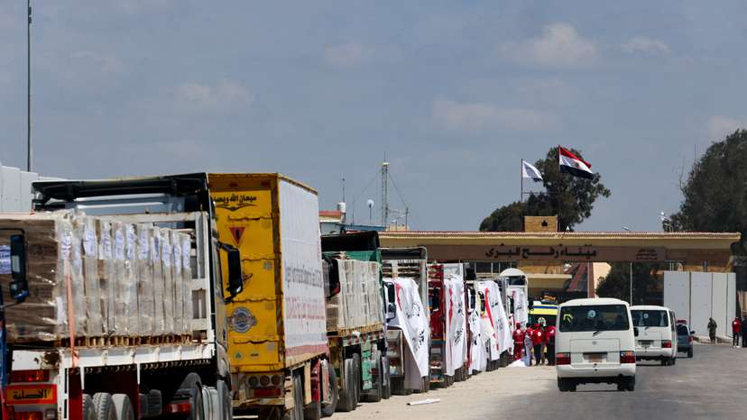 Vehicle line up, near the Rafah border crossing between Egypt and the Gaza Strip, in Rafah