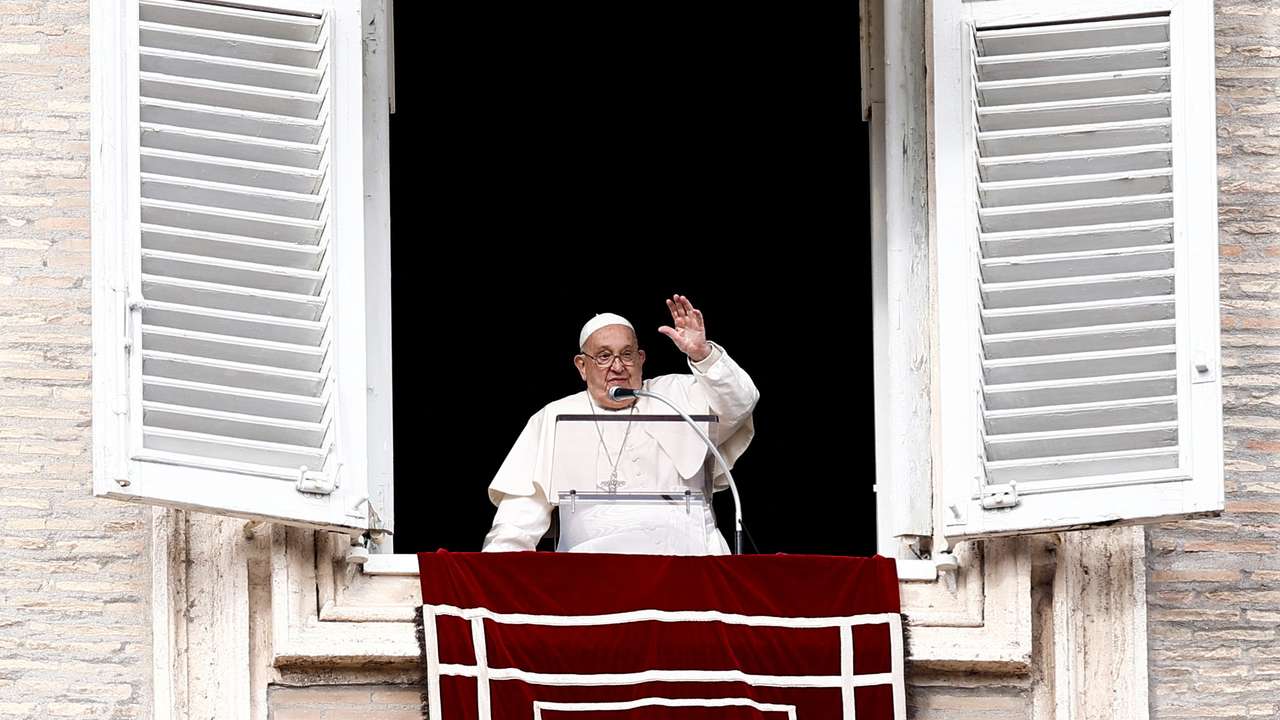 Pope Francis leads the Angelus prayer from his window at the Vatican