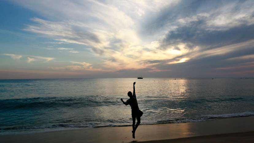 A fisherman throws his line in the morning in Arugam Bay, east of Colombo