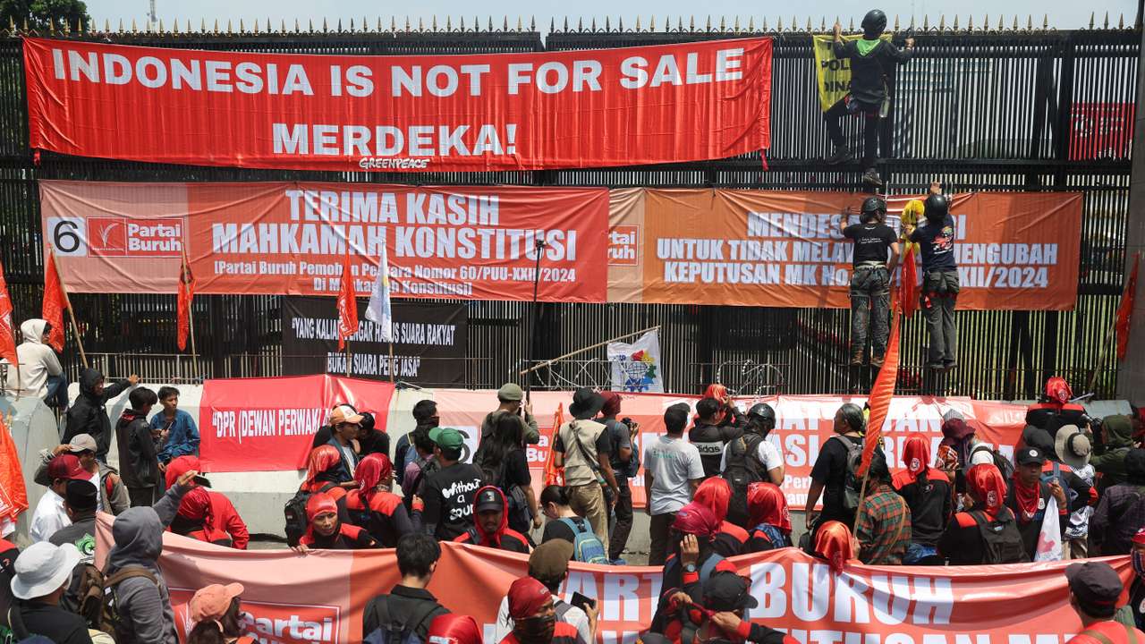 Protest outside the Indonesian Parliament against the revisions to the country's election law in Jakarta