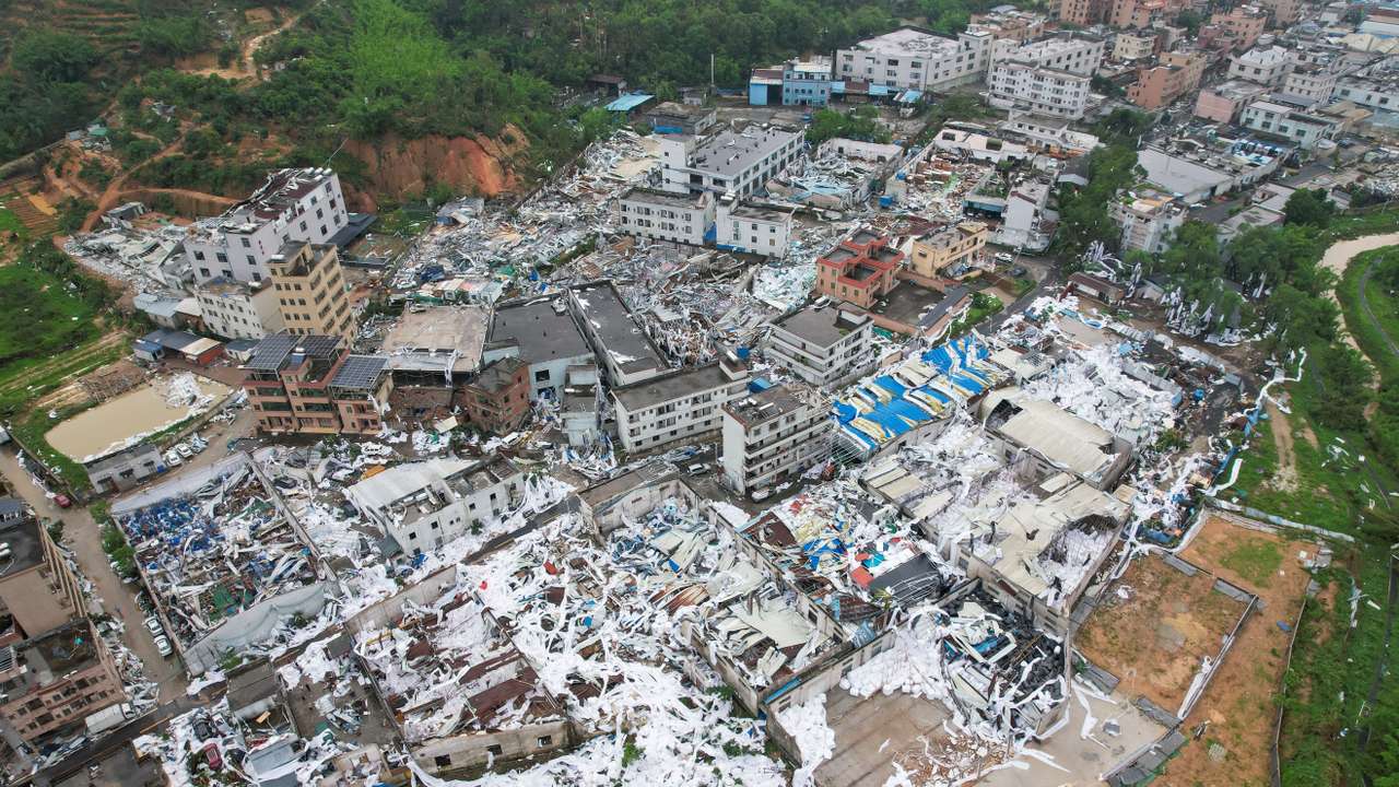 Drone view shows damaged buildings following a tornado at a village in Guangzhou