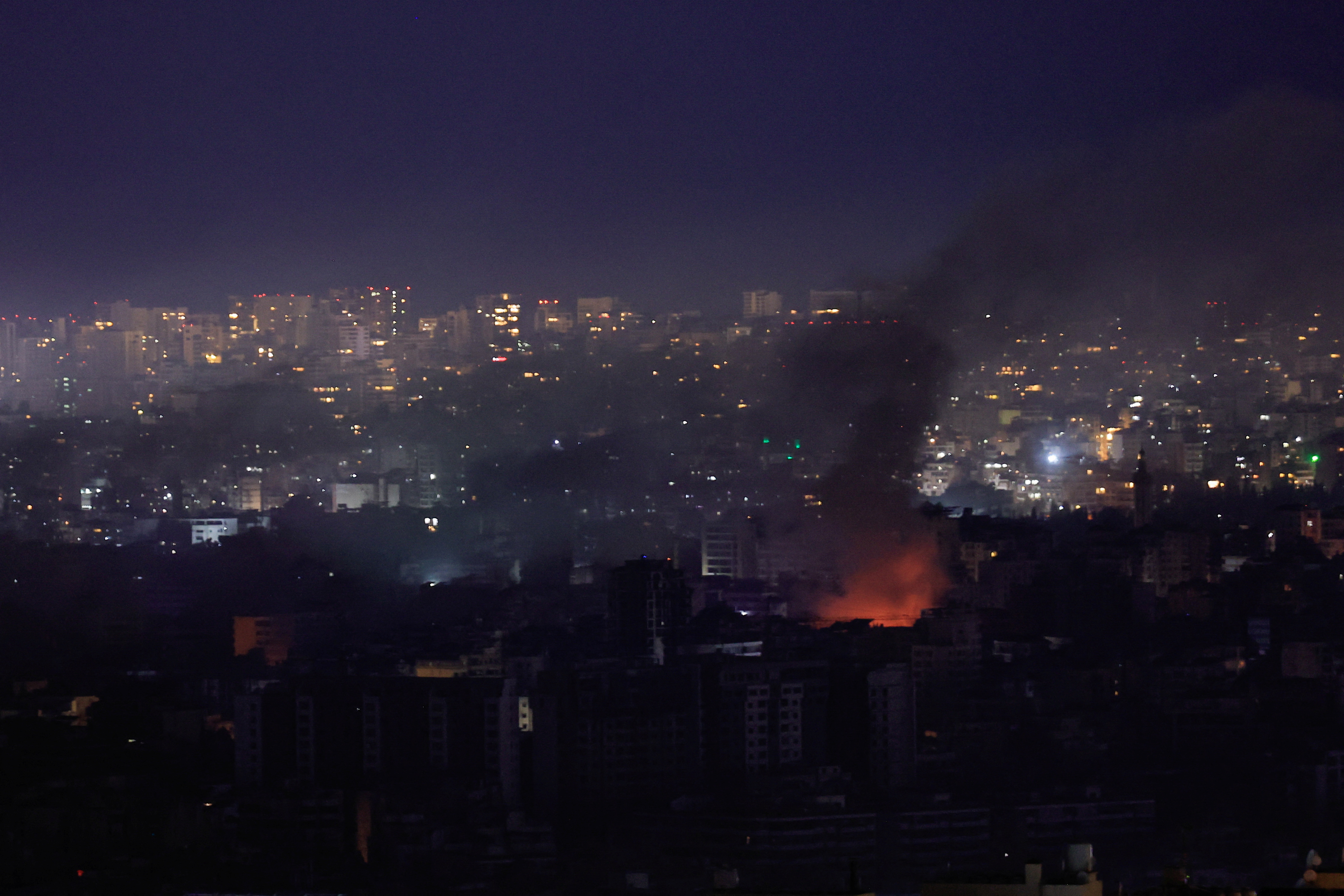 Smoke billows over Beirut's southern suburbs, after an Israeli strike