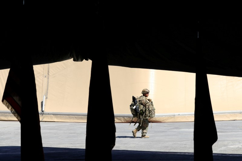 U.S.-led troops withdraw from Iraq's Taji base