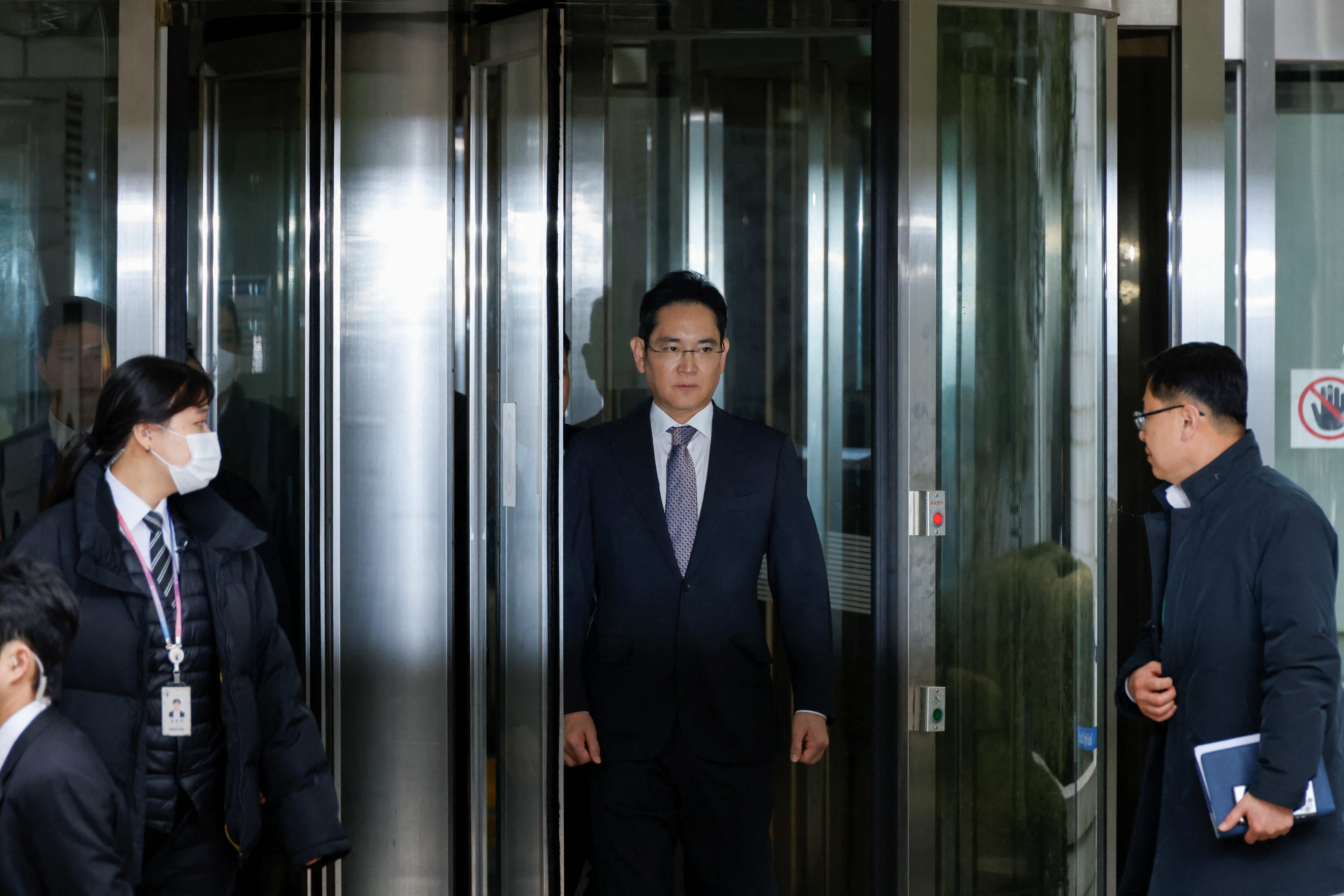 Samsung Electronics Chairman Jay Y. Lee leaves at a court in Seoul