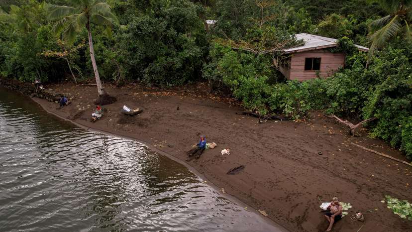 FILE PHOTO: Local residents fish in Fiji