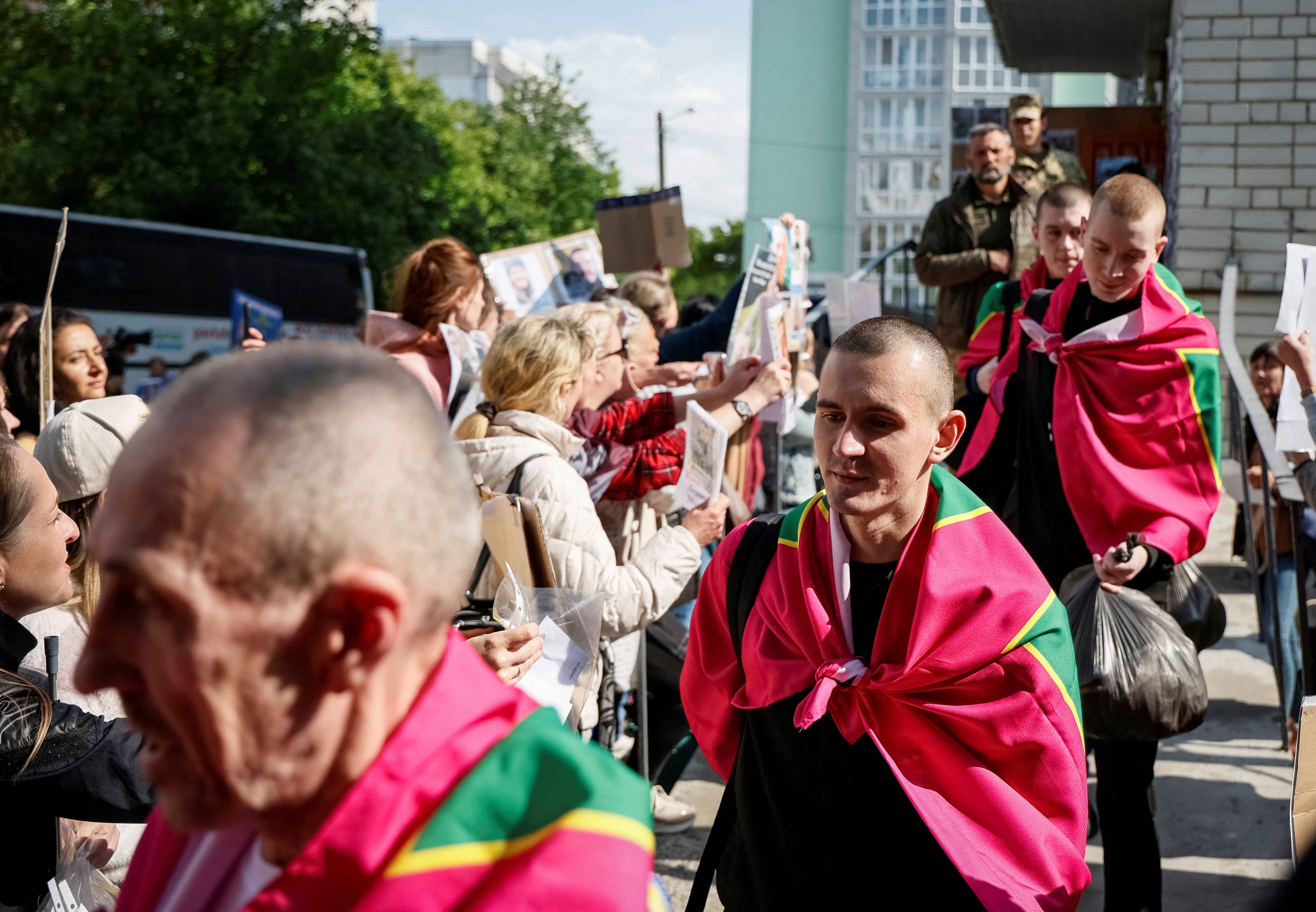 Freed Ukrainian POWs return after a swap, in an undisclosed location in Ukraine