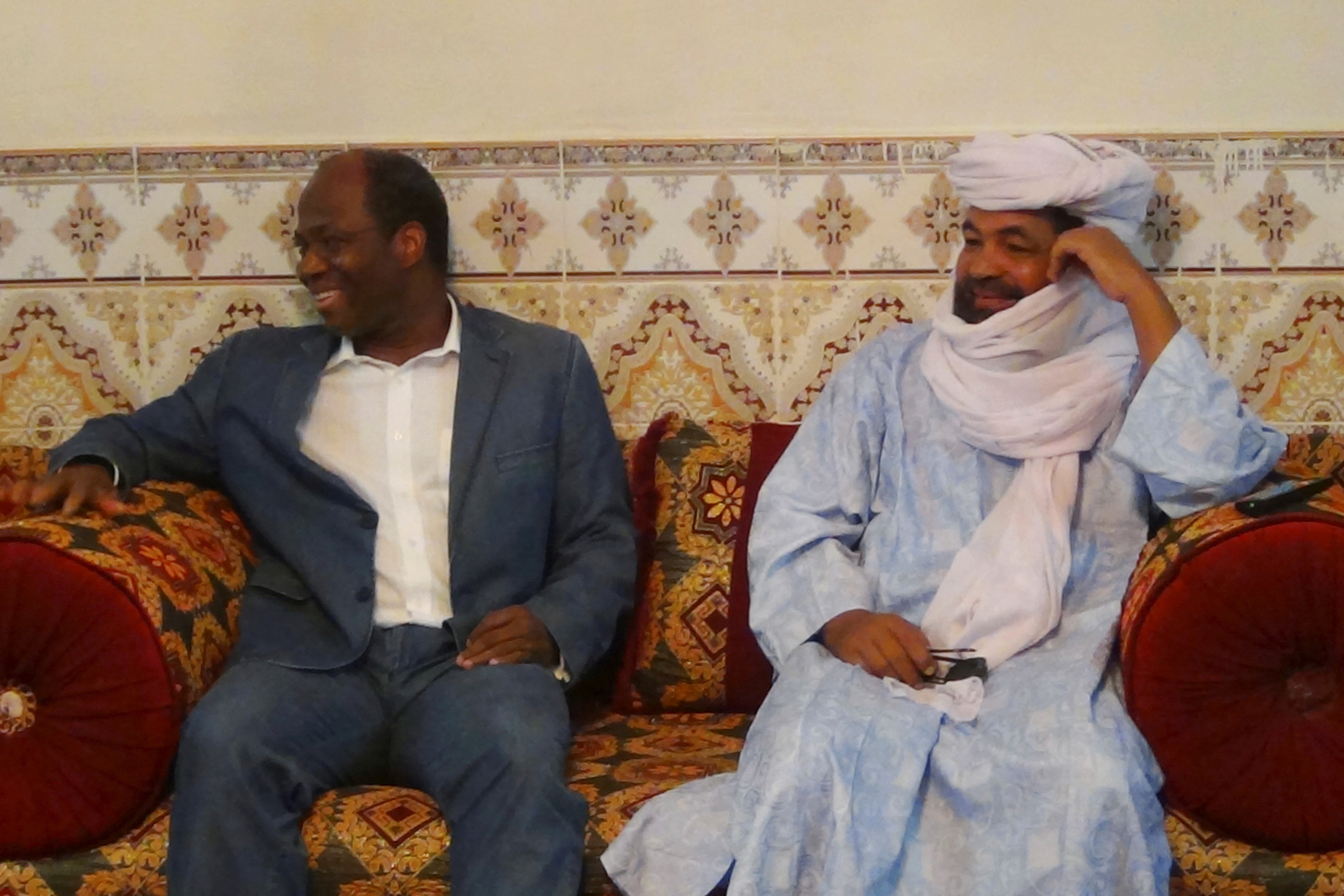 FILE PHOTO: Iyad Ag Ghali, the leader of Ansar Dine, an al Qaeda-linked Islamist group in northern Mali, meets with Burkina Faso foreign minister Djibril Bassole in Kidal, northern Mali