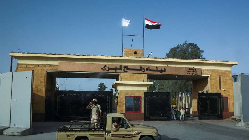 Egyptian soldiers stand guard near the Rafah Crossing at the Egypt-Gaza border, in Rafah