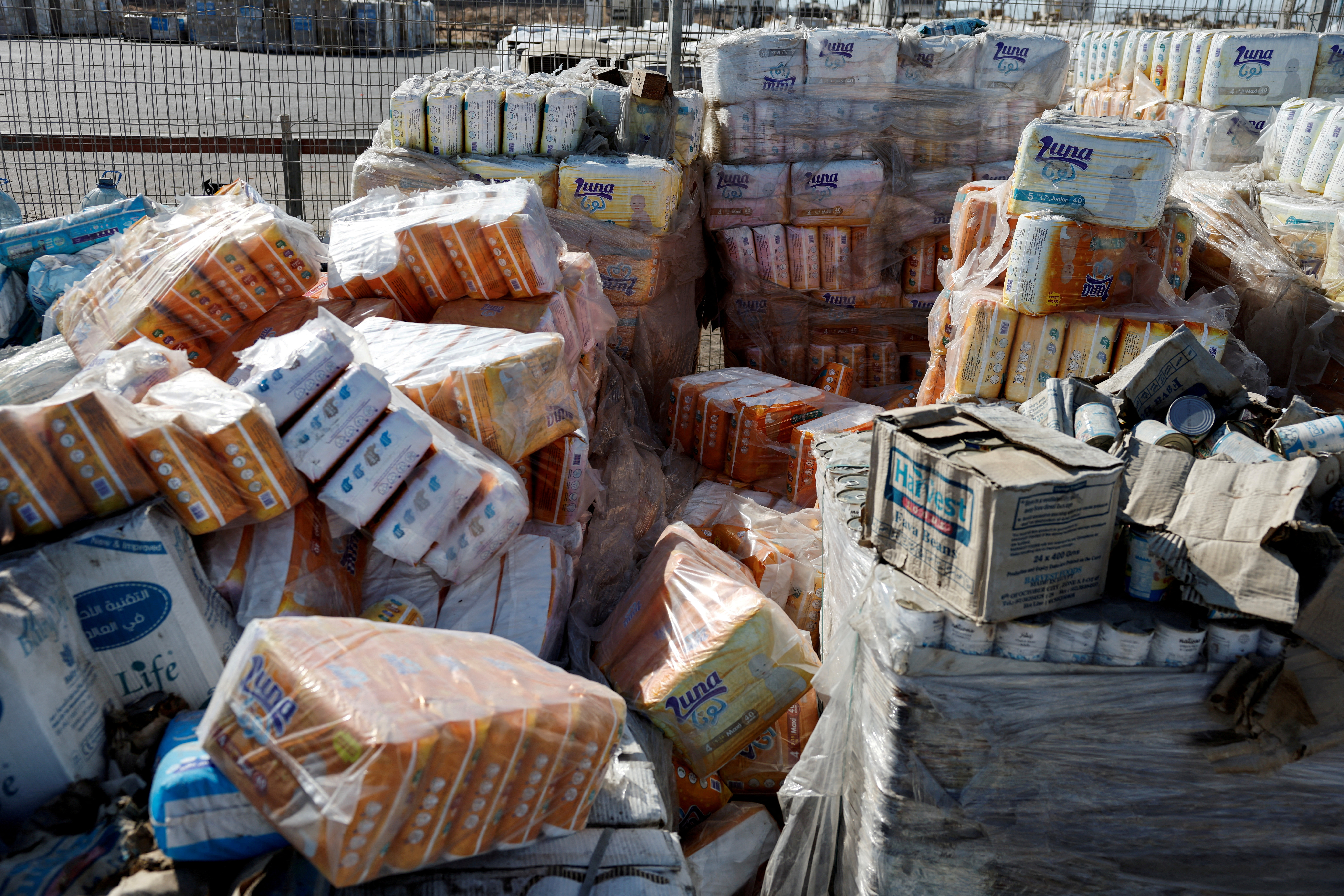 Humanitarian aid is waited to be transferred into Gaza from Israel, at the Gaza part of the Kerem Shalom crossing in the Gaza Strip
