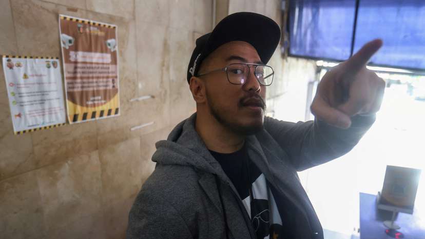 Indonesian comedian Pandji Pragiwaksono talks to journalists in Jakarta