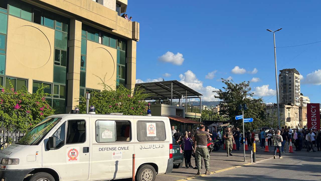 People gather outside Mount Lebanon hospital as more than 1,000 people, including Hezbollah fighters and medics, were wounded on Tuesday when the pagers they use to communicate exploded across Lebanon, according to a security source, in Hazmieh