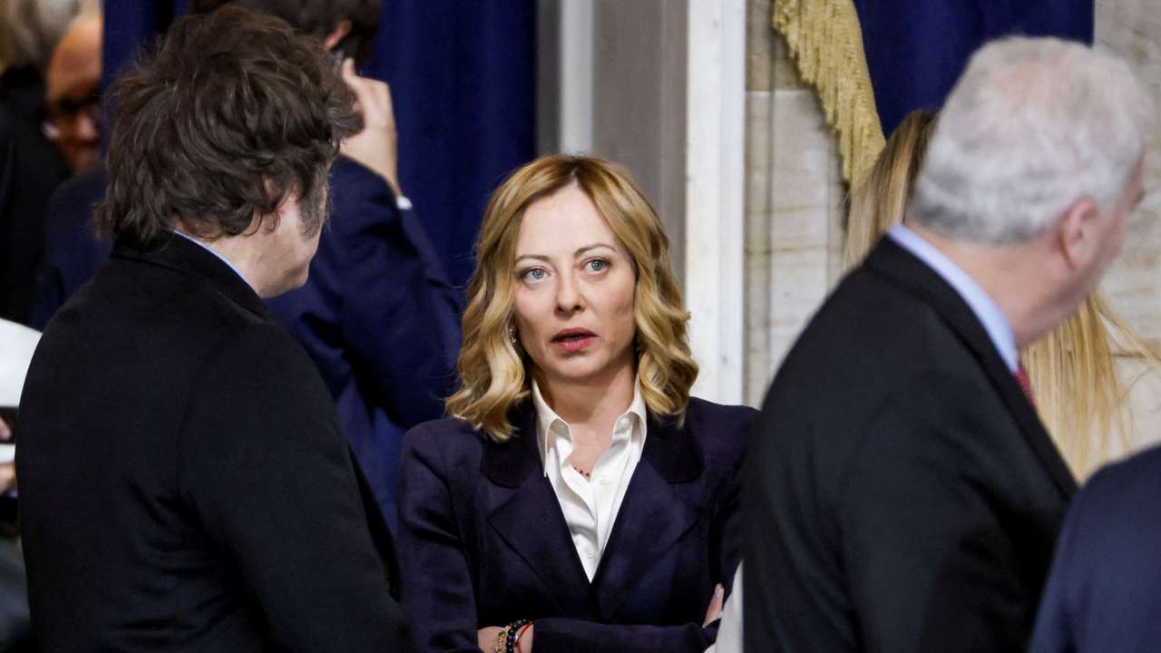 FILE PHOTO: Italy’s Prime Minster Giorgia Meloni (C) and Argentina’s President Javier Milei (L) attend Donald Trump’s inauguration as president of the United States in the rotunda of the United States Capitol in Washington, DC, USA, 20 January 2025. SHAWN THEW/POOL/Pool via REUTERS/File Photo