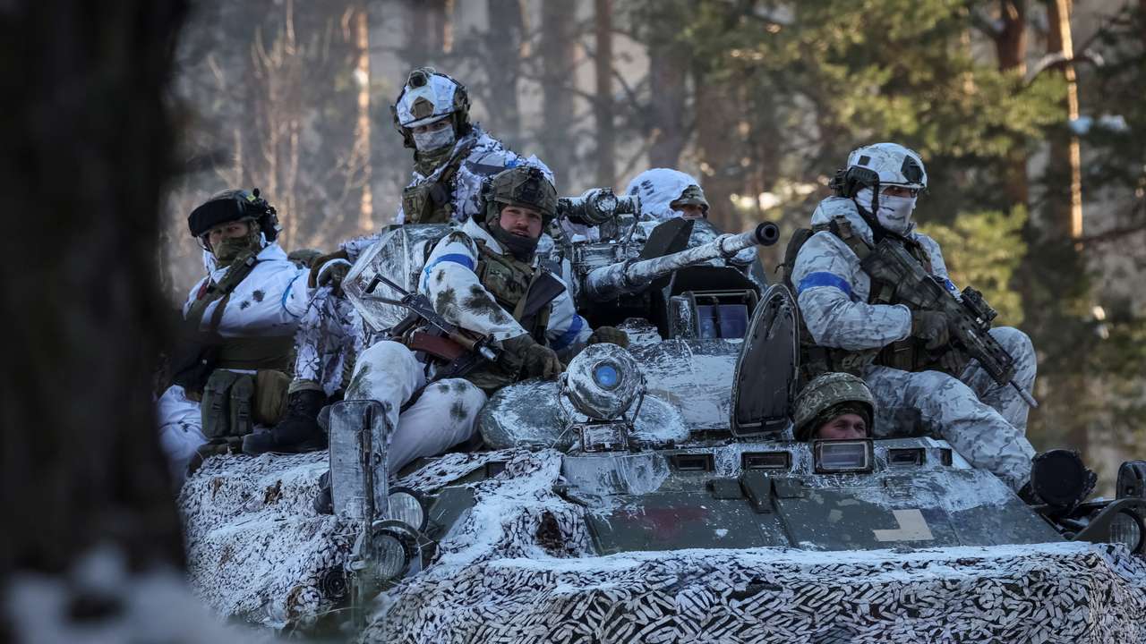 FILE PHOTO: Ukrainian servicemen attend an anti-sabotage mock drills at the border with Belarus in Chernihiv region