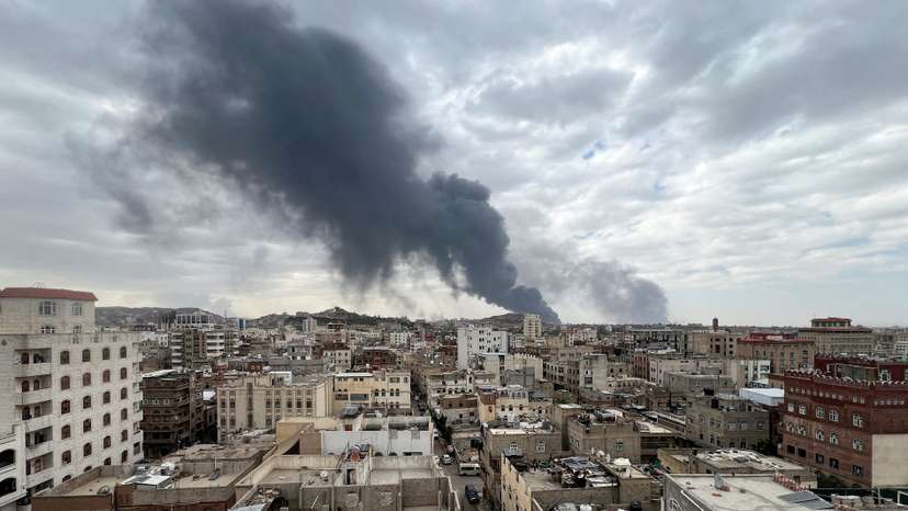 Smoke billows after an Israeli airstrike on Houthi infrastructure, in Sana'a