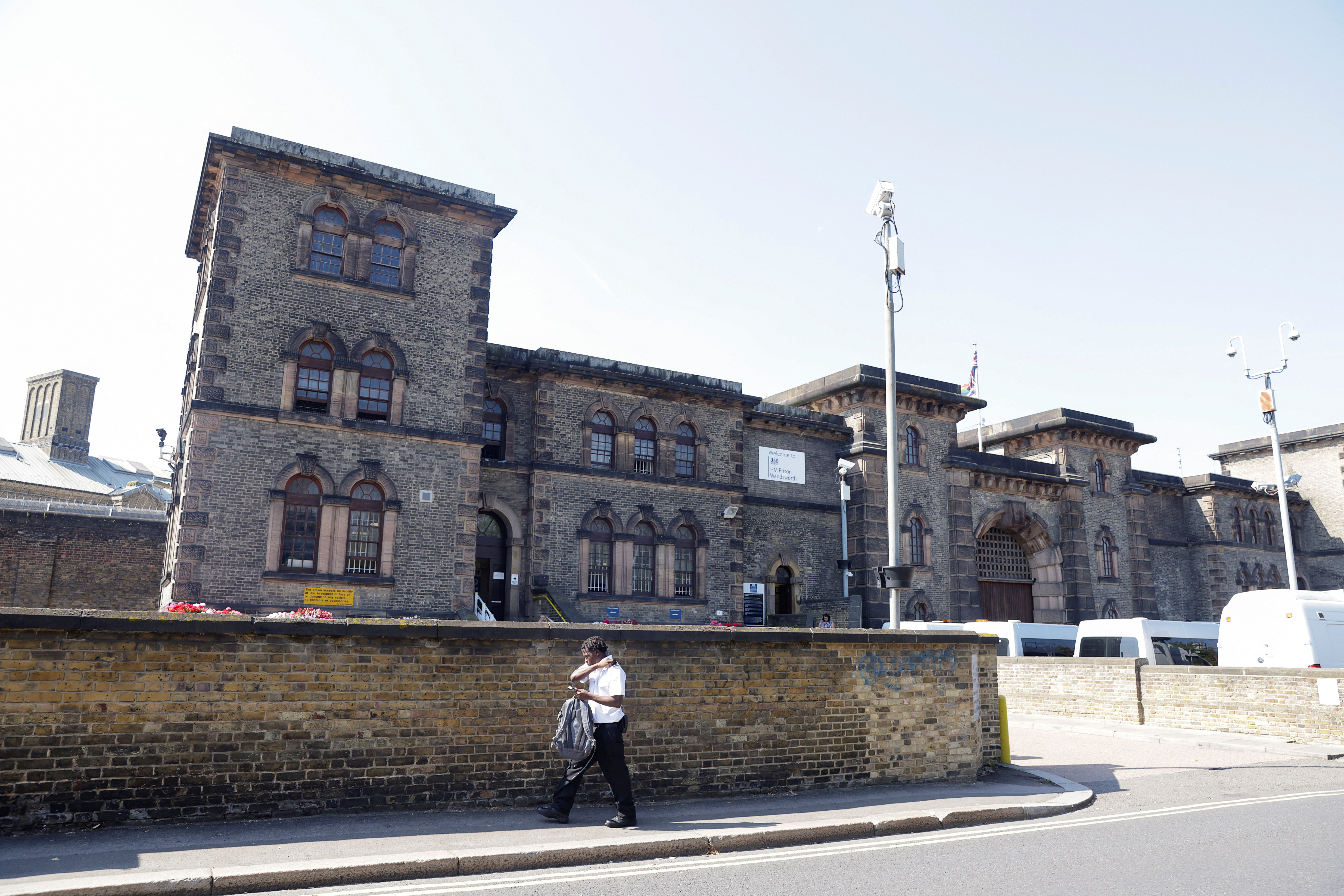 Police search for former soldier suspected of terrorism offences after prison escape, in London