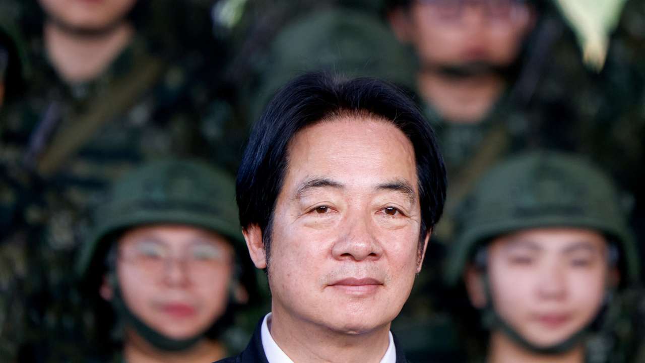 Taiwan President Lai Ching-te inspects reservists during a training session at Loung Te Industrial Parks Service Center in Yilan