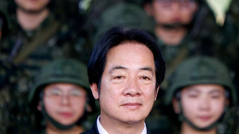 Taiwan President Lai Ching-te inspects reservists during a training session at Loung Te Industrial Parks Service Center in Yilan