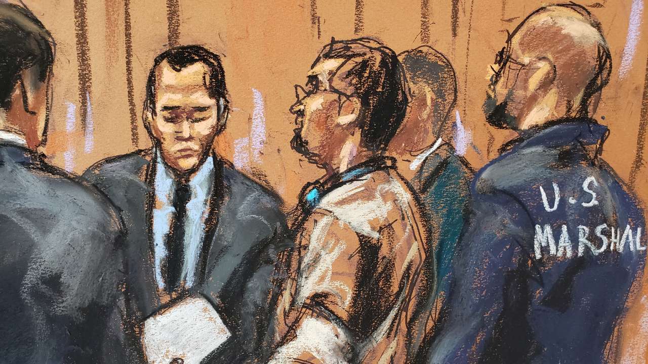 Former Honduran President Juan Orlando Hernandez sits during a court hearing in New York